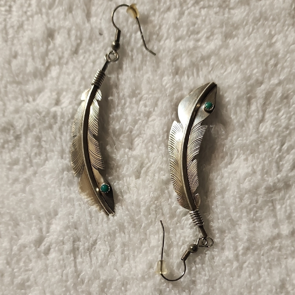 Elegant Silver Feather Earrings with Green Gem